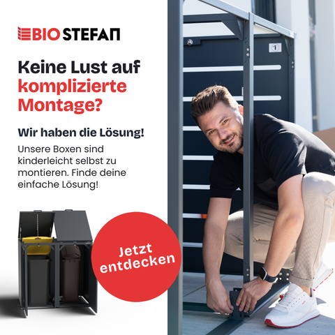 Mann montiert BIO Stefan Mülltonnenbox neben Werbetext.