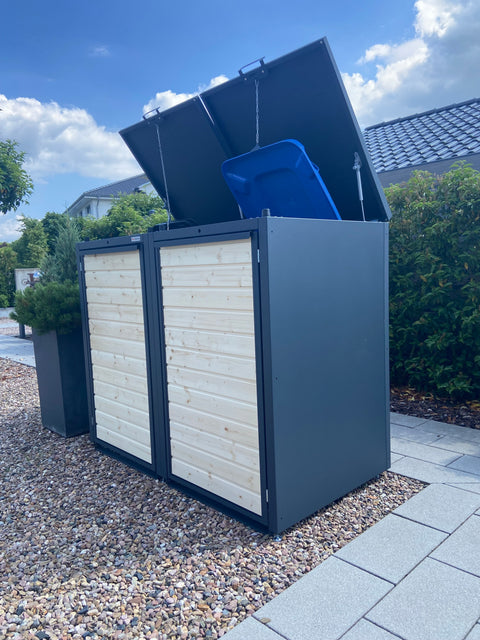 BIO Stefan garbage bin box with open lid and blue bin, modern and stylish on stone floor.