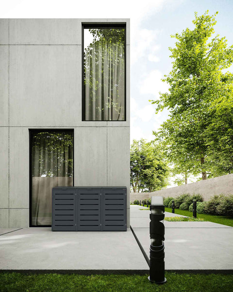 Moderne antracietkleurige afvalcontainerbox van BIO Stefan voor een stijlvol betonnen gebouw.