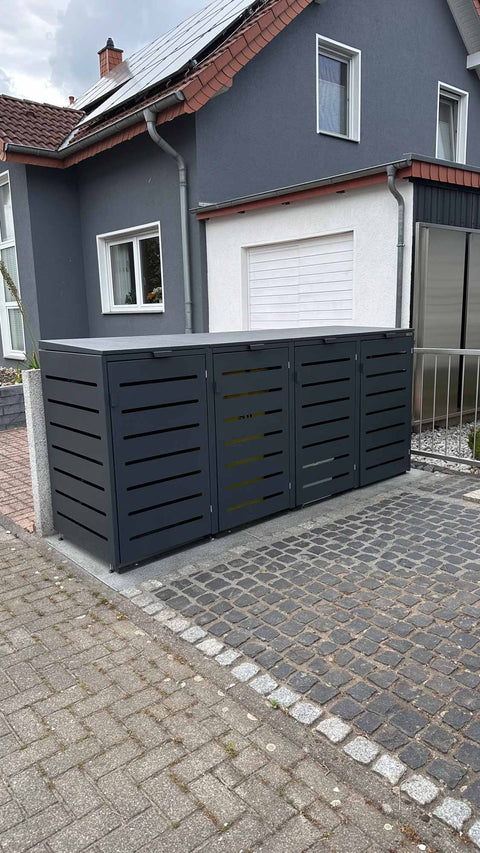 Grijze box voor vuilnisbakken van BIO Stefan voor een huis.
