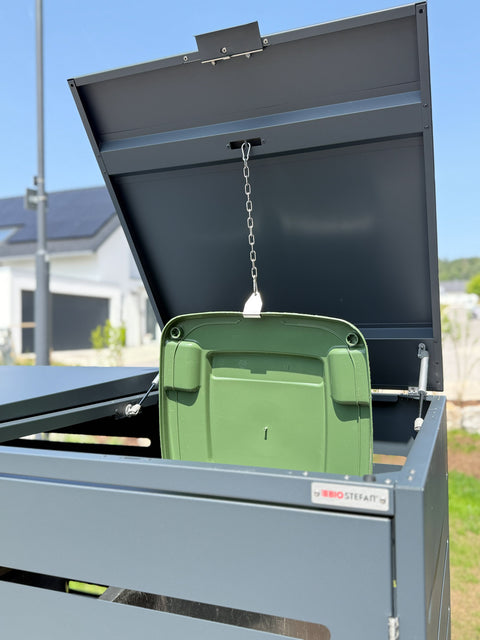 BIO Stefan box voor vuilnisbakken met open deksel en groene vuilnisbak.