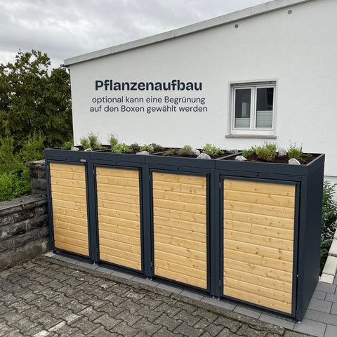 Cassonetto per bidoni Holzmichl con opzione di verde davanti a parete bianca.