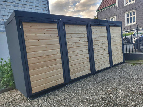 BIO Stefan Holzmichl Mülltonnenbox 4er Kombination 120l 240l in Anthrazit mit Holzfront und Pflanzdach im Hof