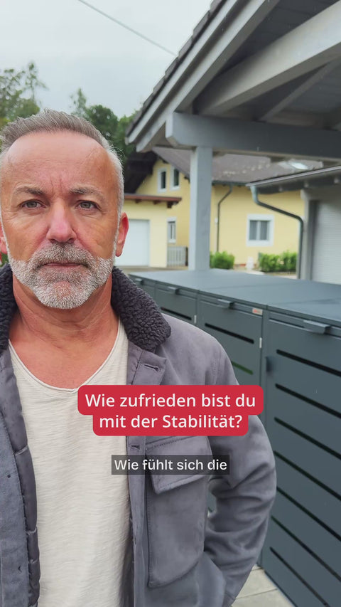 Mann vor BIO Stefan Mülltonnenbox, Text: „Wie zufrieden bist du mit der Stabilität? Wie fühlt sich die“